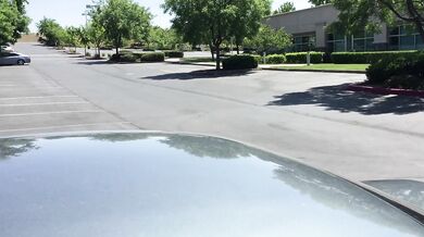 Horny redhead sucking cock in the parking lot