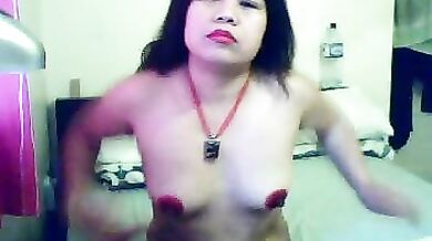 Horny MILF plays with her pussy on camera