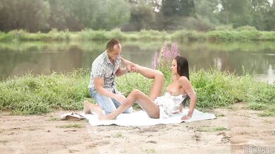 Viktoria Sweet enjoys a hard handjob and a messy finish under the sun